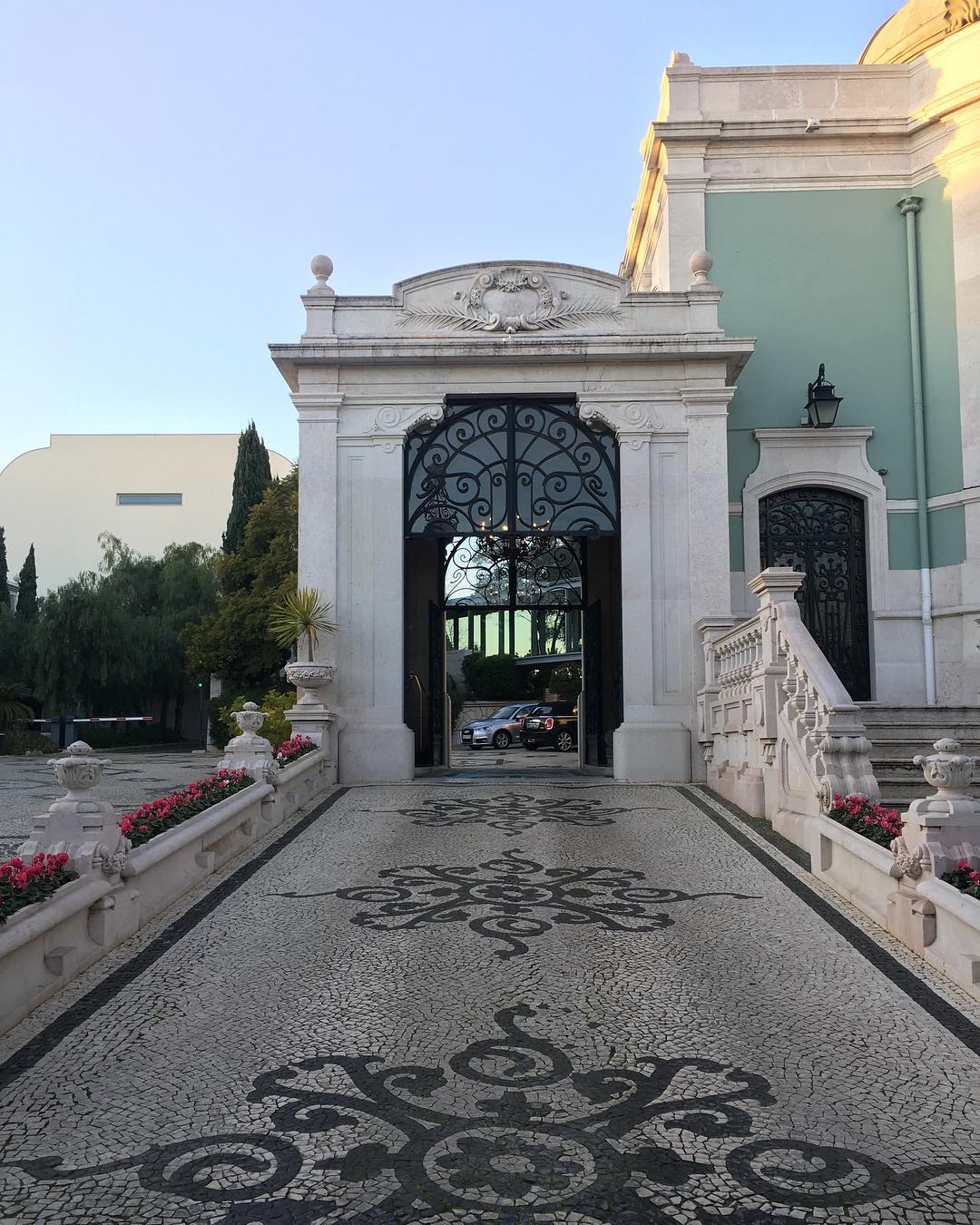 Sunset over the entrance/driveway of the Pestana Palace i...
