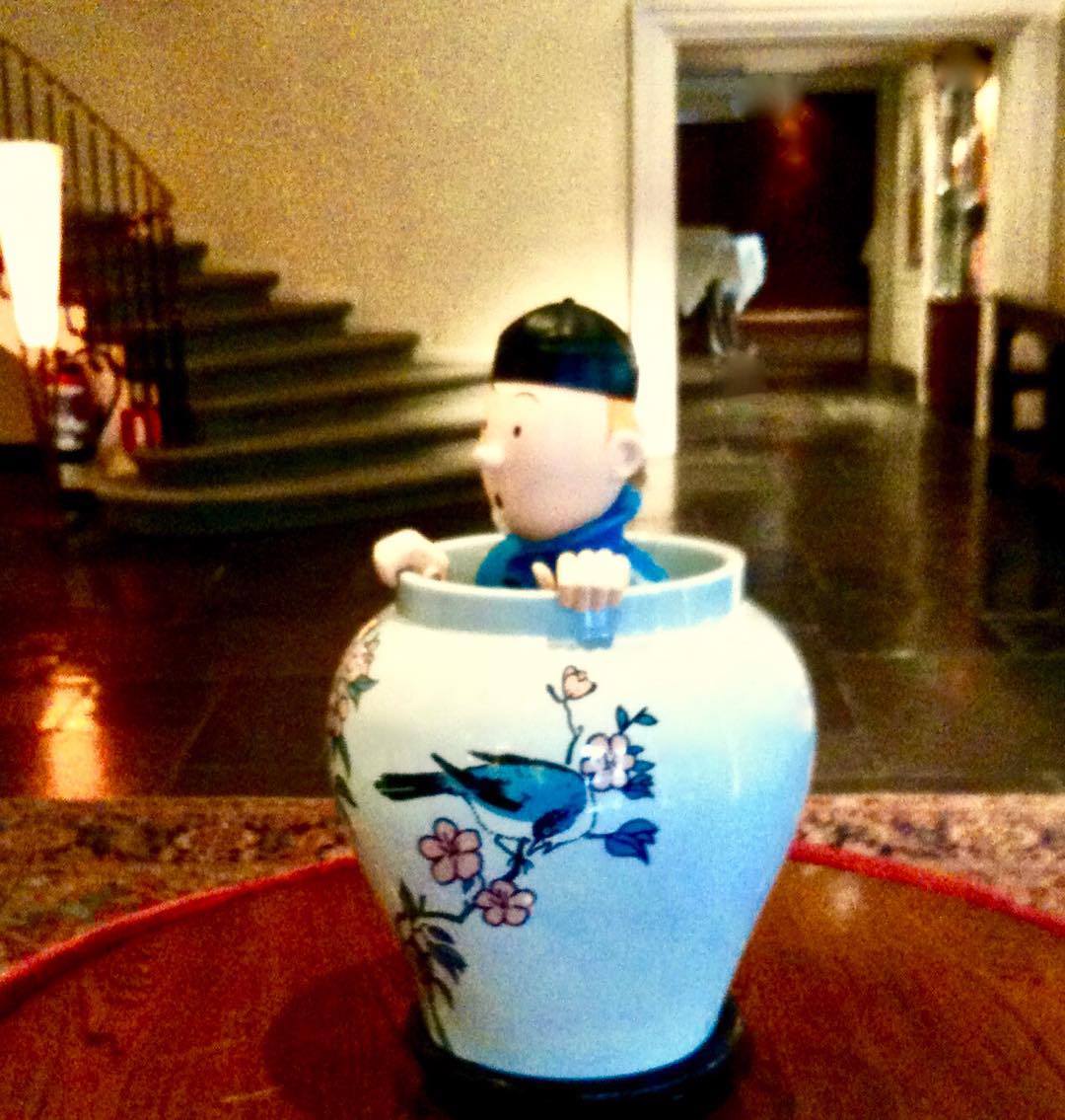 In the lobby of the Hotel Amigo in Brussels Tintin peeks ...