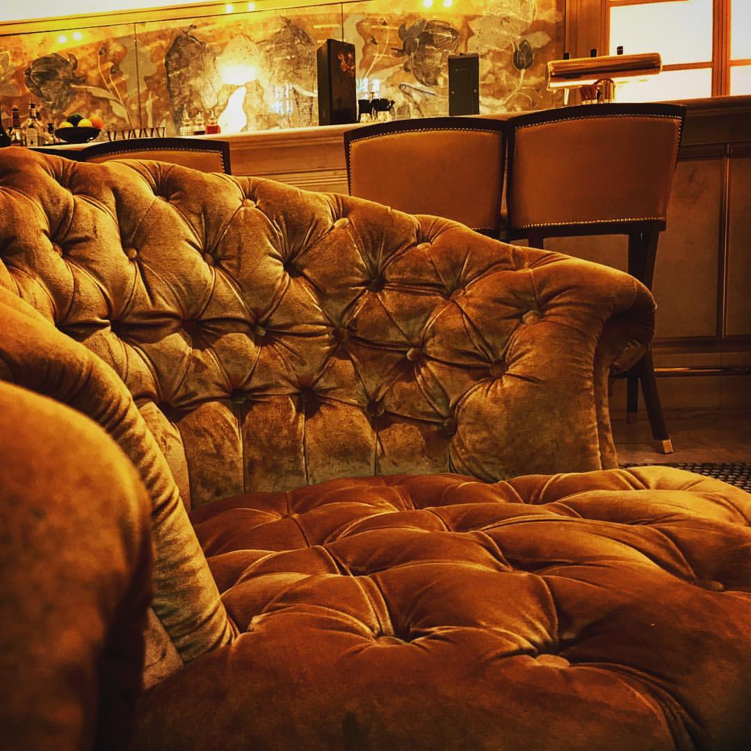 I love the warm golden colouring of the seating furniture...