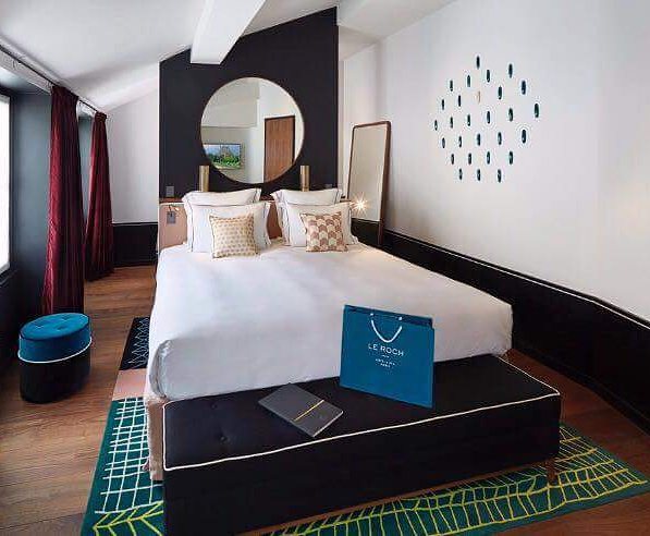 Comfy bed and walk in closet at Le Roch Hotel and Spa, th...